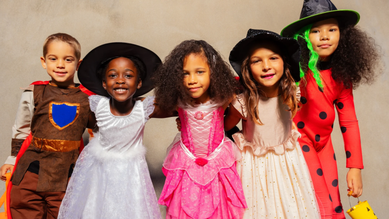 Kids share their Halloween costumes, including princesses and superheroes.